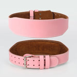 Pink and brown weightlifting belt on a light gray background